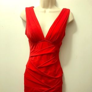 Red mini dress with pleated front and ruched back